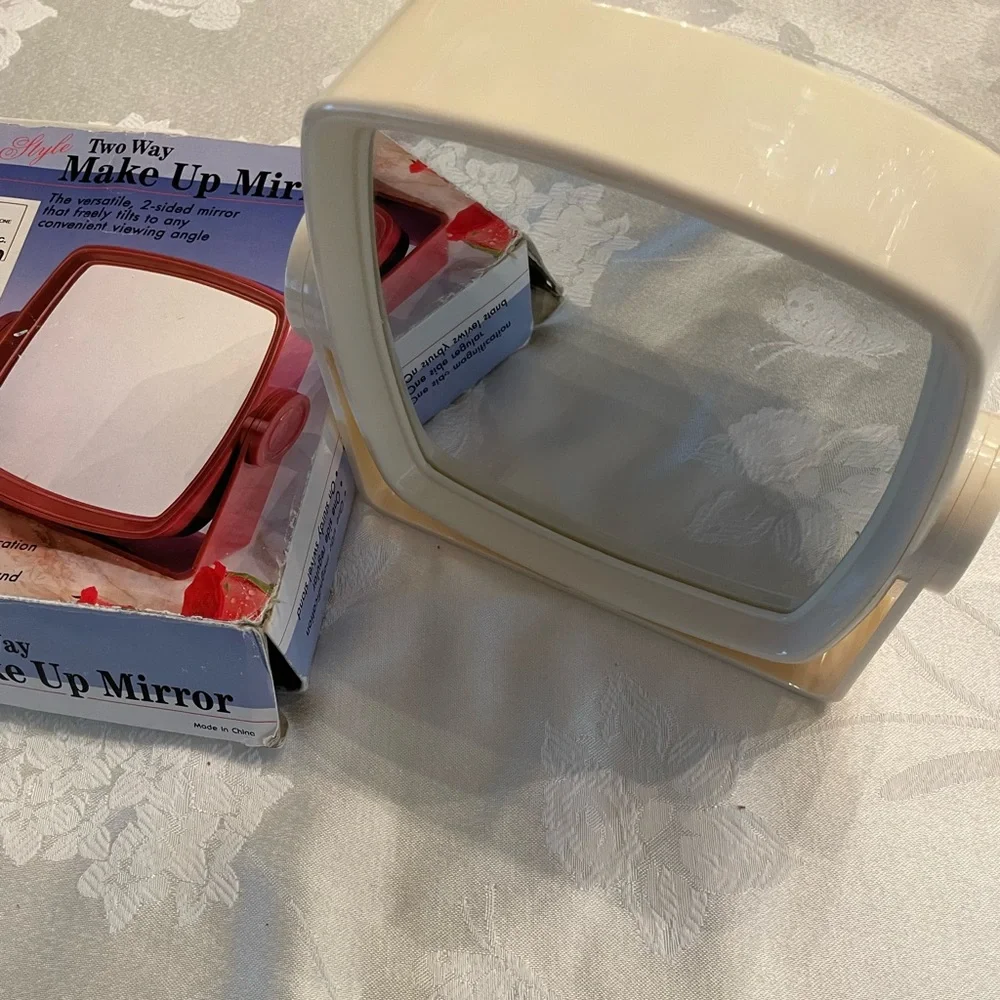 Makeup mirror on stand is a sturdy lucite case